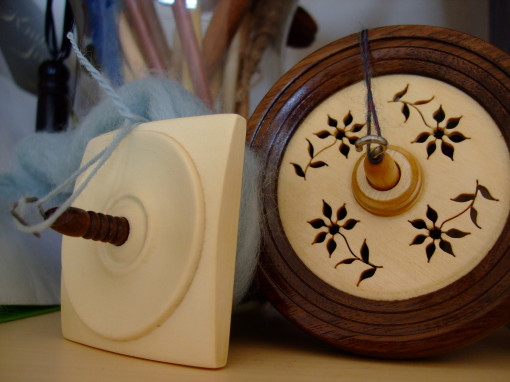 Left: Spindlewood Square Mini, Holly/Walnut Shaft; Right: Wooly Designs Flowers Rim-Style